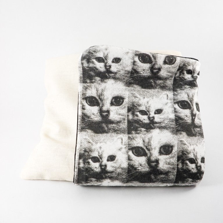 The pillow cover and the satchel bag.