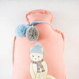 Hot rubber water bottle with a soft pink flannel cover and a kitty cat character embroidered on the middle.