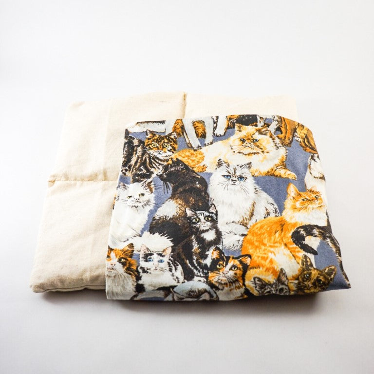 One heating pack consist of one calico bag and one cover. The calico bag is filled with organic wheat that is safe and pet-friendly.