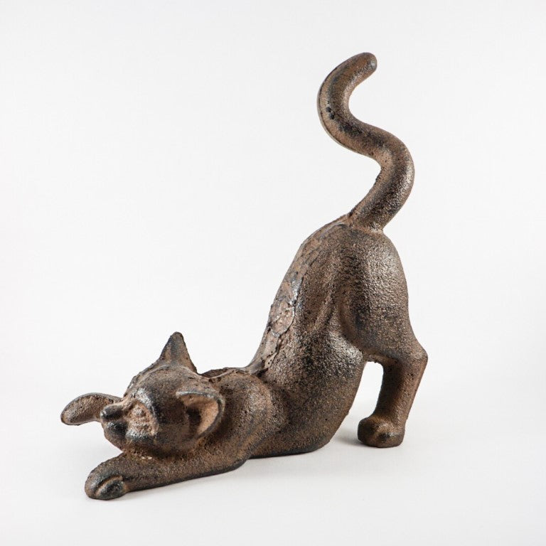 Made out of cast iron, weight is sufficient for a doorstop.