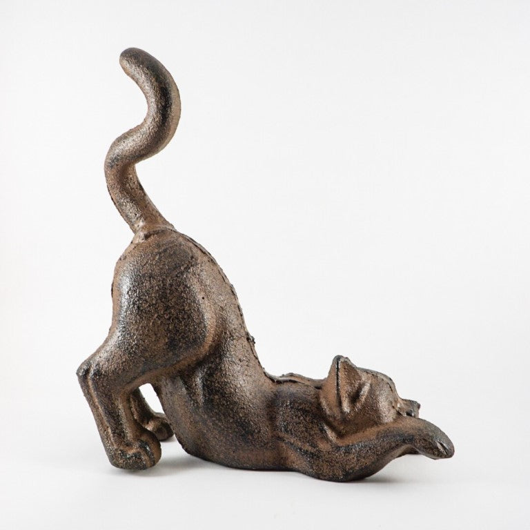 Cat figure imitating a playful cat during their pay time.