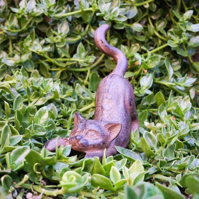 Playful cat figure makes a perfect decoration for your beautiful garden.