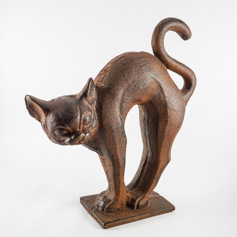 Made out of cast iron, weight is sufficient for a doorstop.