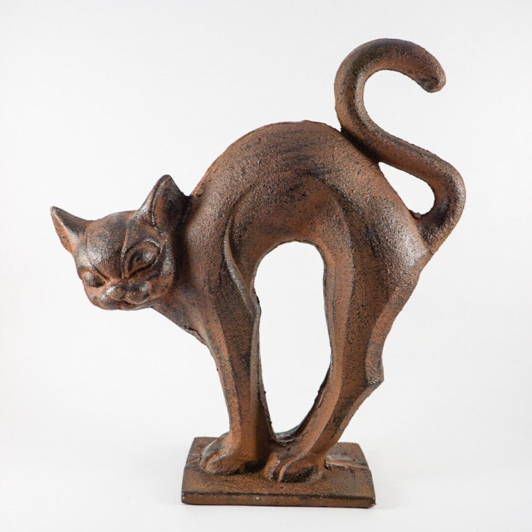 Cat figure imitating a cat stretching after waking up from a deep sleep.